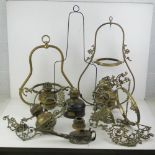 A quantity of lighting fixtures including brass fittings, crystal drops, etc.