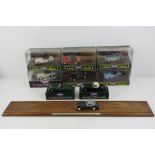 A set of five Corgi Classic Models sports cars with wooden stand, boxed.