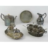 A quantity of silver plated wares including teapot, boiled eggs tray, cruet set, etc.