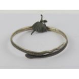 A white metal and niello work upper arm bangle in the form of a snake, approx 7.3 int dia.