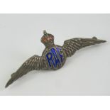 A sterling silver and enamel RAF 'Wings' sweetheart badge, 5.8cm wide.