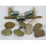 Two pairs of 9ct gold on silver cufflinks,