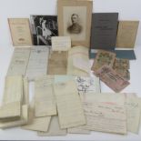 A quantity of assorted paper ephemera including autograph book, maps, photos, bank notes, etc.