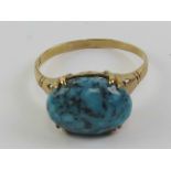 A 9ct gold an turquoise ring, stamped 9ct, size S, 2.68g.