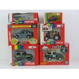 A quantity of boxed Britains vehicles; Massey Feruson MF362 tractor, National Trust Land Rover,