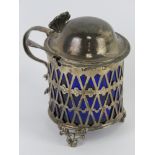 A George III silver mustard having pieced sides with Bristol blue glass liner,