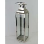 A large Stainless Steel and glazed "Storm" lantern standing 61 cm high.