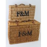 A pair of graduated Fortnum and Mason's picnic basket hampers. Largest approx 52 x 34 x 24cm.