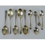 A set of five HM silver teaspoons, together with a pair of coffee spoons hallmarked for Sheffield,