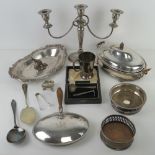 Quantity of silver plated items including wine coaster, candelabra, chafing dish etc.