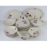 A J&G Meakin part dinner service decorated with pink floral design.