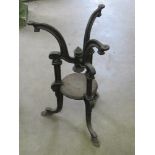 A cast iron pub table base having patent number upon.