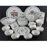 A quantity of Portmerion in Botanic Garden pattern including chargers, plates, mixing bowl, jug,