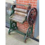 A 'new duplex' hand cranked mangle with rollers, sprung tensioners and gear cogs,