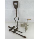 A vintage table top meat mincer together with a wooden clamp and an antique garden implement 3