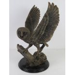 Contemporary resin sculpture of an owl about to take flight 39cm high