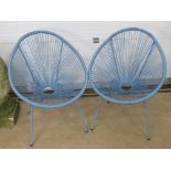 A pair of 1960's egg style aqua blue garden chairs.