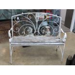 A metal framed white painted folding garden bench.