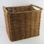 A large square shaped fireside wicker log basket 54 x 40 x 47cm