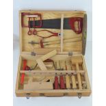 A tool set including spanners, plane, chisels, saw hand drill etc by Krakpol.