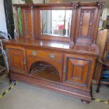 A fine Edwardian mirror back chiffonier in walnut.