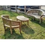 A matched pair of wooden kidney shaped garden benches,