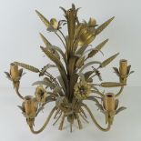 A gold painted "Harvest" design pendant light fitting.