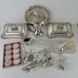 A quantity of assorted silver plate including flatware, tureens, coffee pot, coasters, etc.