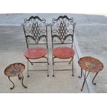 A pair of garden bistro chairs with pair of graduated sunflower tables.