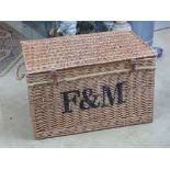 An oversized coffee table type Fortnum & Masons wicker hamper, 79 x 51 x 49cm.