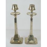 A pair of Art Deco HM silver candlesticks made by W G Sothers Ltd, hallmarked Birmingham 1923,