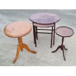 A nest of two tables together with a wine table and a pine occasional table.