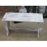 A white painted garden bench, 75cm wide.