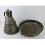 A large copper colander and jug of Arabic influence, colander 41.5cm dia.