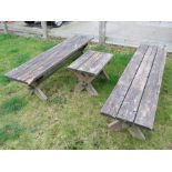 A pair of three plank picnic table type benches together with matching single seat.