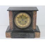 A 19th century slate and marble architectural mantel clock