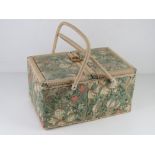 A vintage sewing box in 1970s Liberty style fabric.