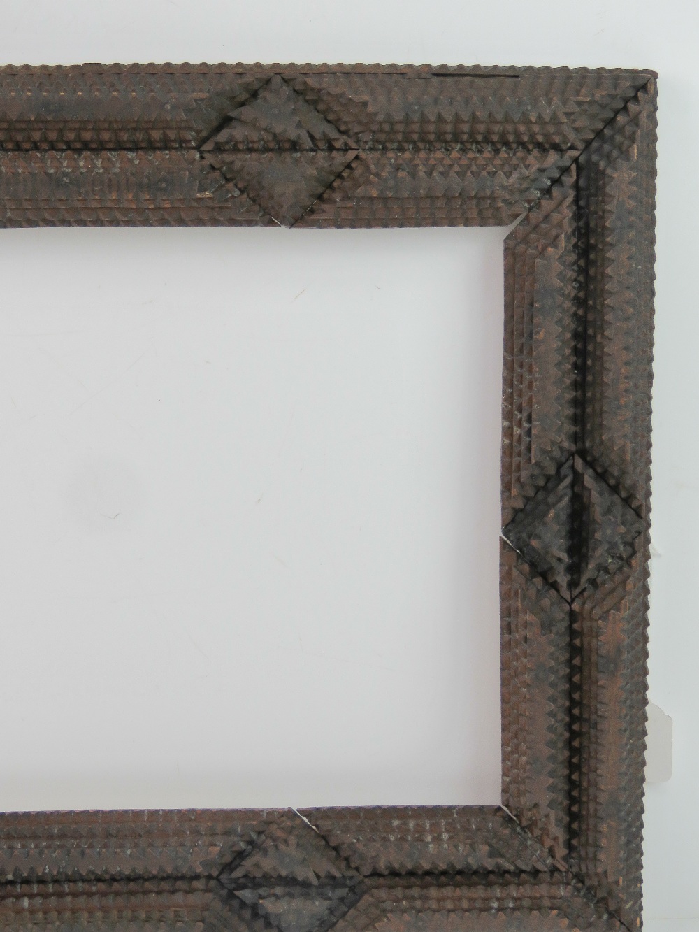 Folk Art / Tramp Art frame - an unusual circa 1900 hand carved multi sectional stained pine picture - Image 2 of 3