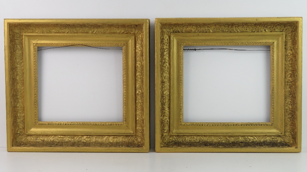 A pair of 19 thC French Gilt Frames - a pair of swept frames with acanthus and egg & dart