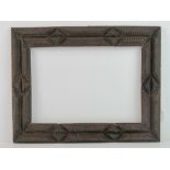 Folk Art / Tramp Art frame - an unusual circa 1900 hand carved multi sectional stained pine picture