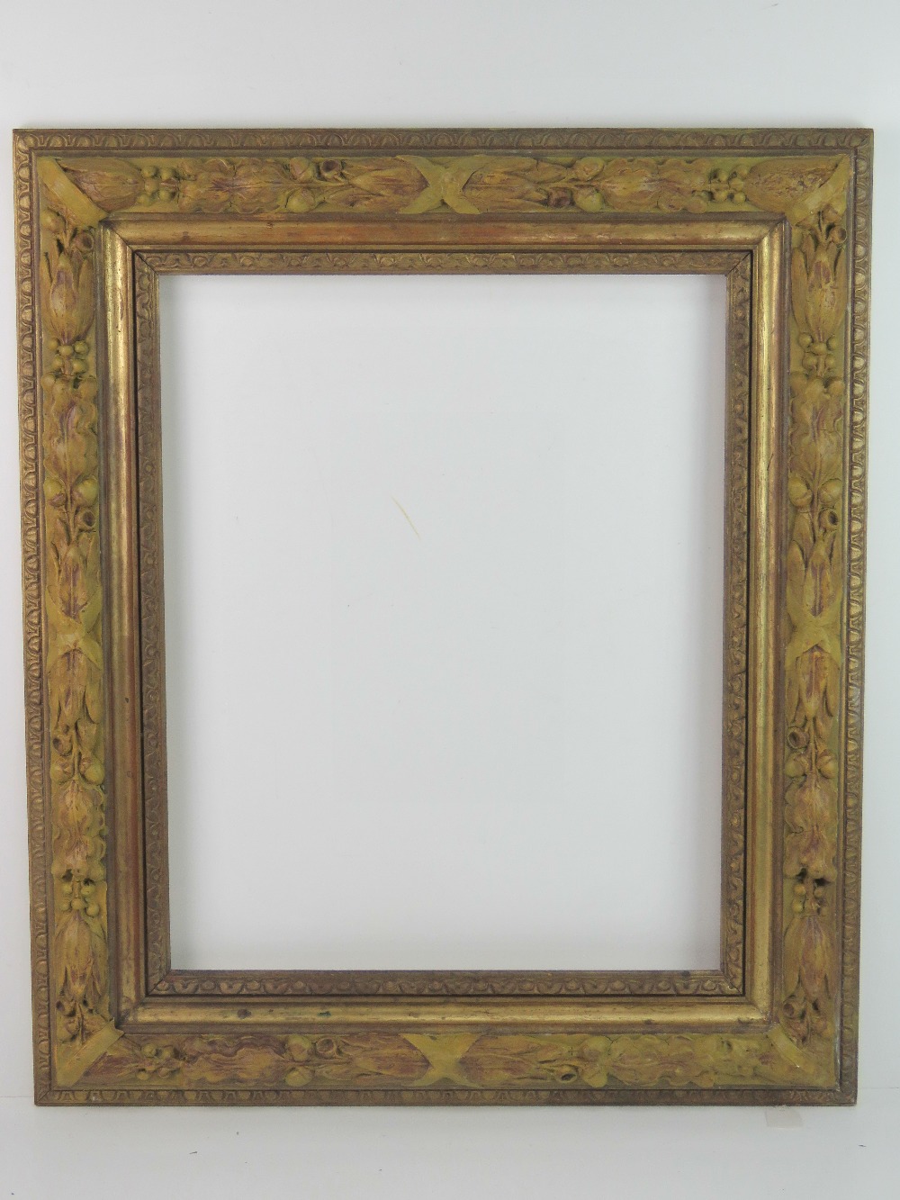 Mid XX relief and gilt frame - an unusual ribbon,