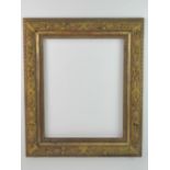 Mid XX relief and gilt frame - an unusual ribbon,
