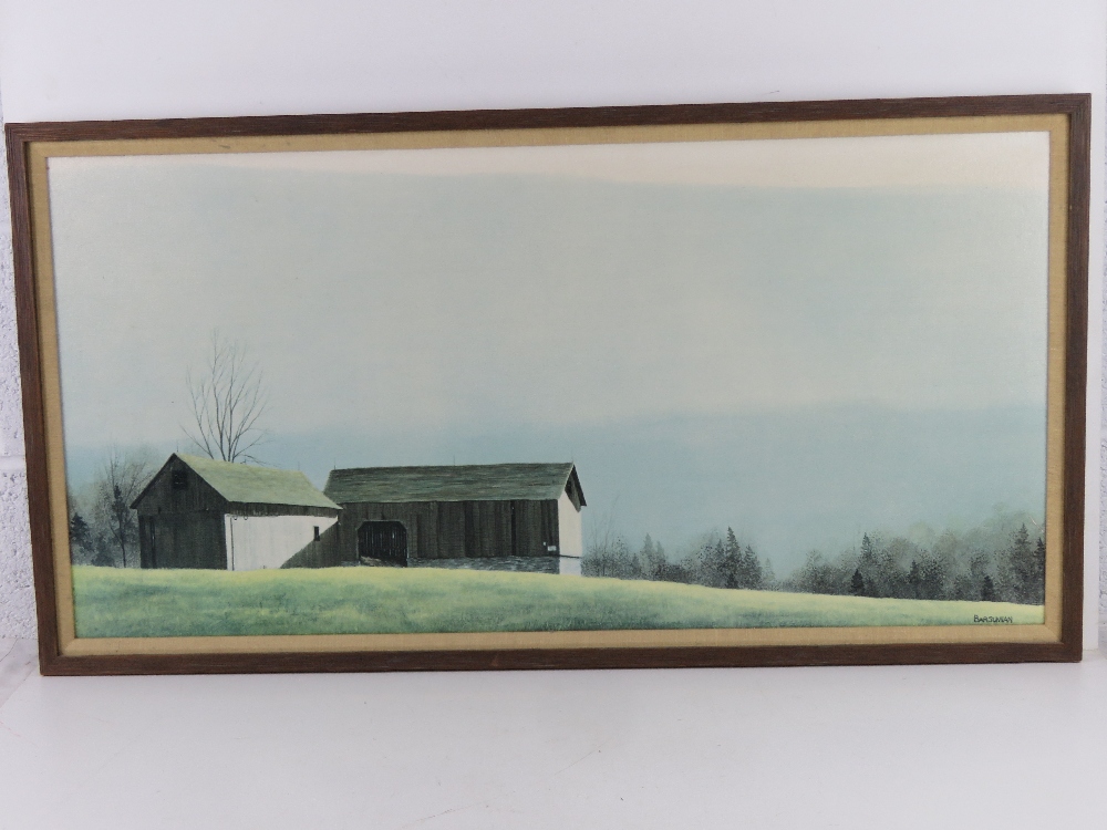 A minimalistic print on canvas of a farm house, framed.