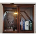 A glazed bookcase,