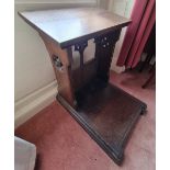 A late Victorian oak prayer desk having quatreform pierced carving,