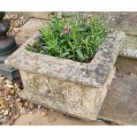 A pair of square shaped stone planters having quatrefoil decoration, 34 x 34 x 24cm.