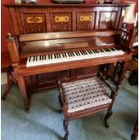 An upright overstrung piano in the Arts & Crafts style by Gors & Karlmann, 148 x 66 x 128cm.