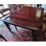 A Victorian pull out mahogany dining table with three leaves to seat 12, chairs not included,