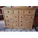 A contemporary pine chest of three over six drawers, 150 x 45 x 105cm.