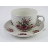A Portmeirion oversized cup and saucer -